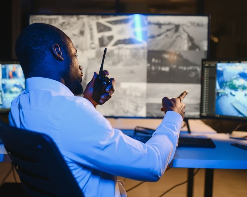Corporate professionals analysing reports and data together, supporting forensic investigation and business intelligence work.